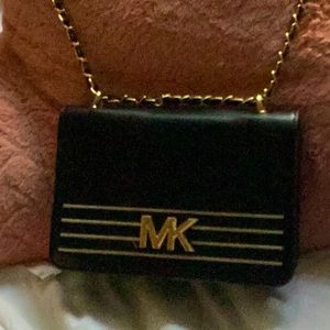 Micheal Kors black& gold purse